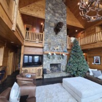 Grand Lake Ok Vacation Rental Living Room With Christmas Tree Griswolds Last Resort 20250823 172019 (1)